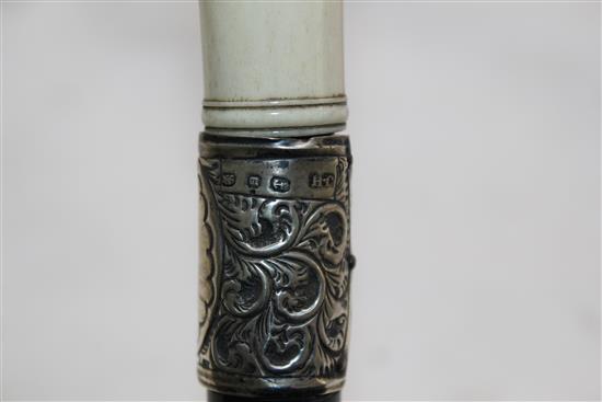 A late Victorian ebonised walking cane, 36in.